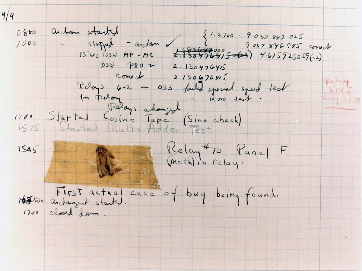 A 1947 logbook page with a moth taped to it, captioned "First actual case of bug being found."